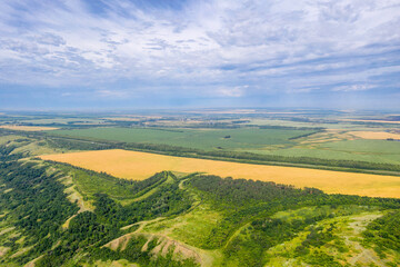 Rural landscape. Aerial view of farm filds on sunny summer day. Saratov Oblast, Russia.