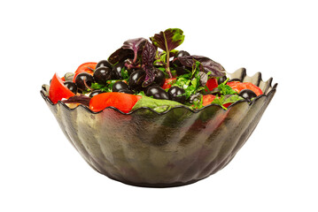 Vegetarian vegetable salad in a glass plate isolated on white