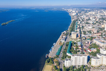 Fototapeta premium Drone view of Saratov and Volga river embankment on sunny summer day. Saratovskaya Oblast, Russia.