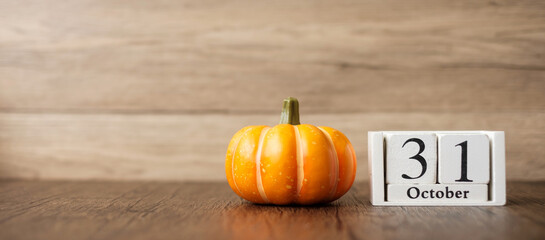 Happy Halloween day with pumpkin and 31 October calendar. Trick or Threat, Hello October, fall...