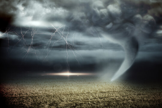 Stormy Sky With Tornado Over Field