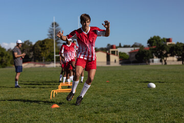 Rugby players exercising during a training session
