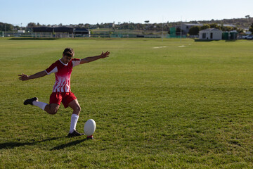 Rugby player shooting in the ball