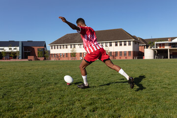 Rugby player shooting in the ball