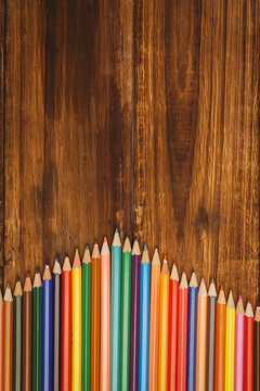 Color pencils on wooden table