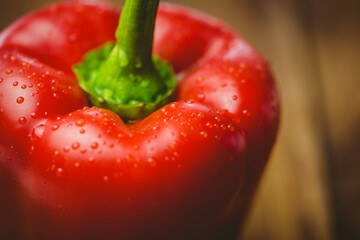 Fresh red pepper with water drops