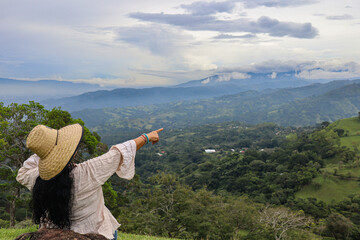 Woman pointing nature
