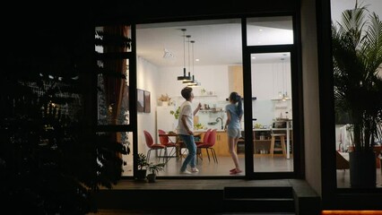 Happy young couple dancing at home,4K