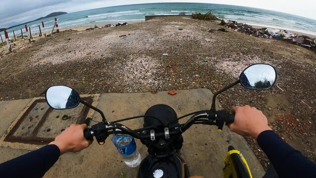 motorcycle road bike trip arriving at destination in beautiful paradise tropical beach ready to surf waves