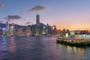 Fototapeta premium Victoria Harbor of Hong Kong city under sunset