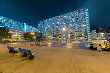 basket court and playground of public estate in Hong Kong city at night