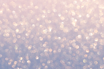 Glitter defocused background in pastel colors with bokeh