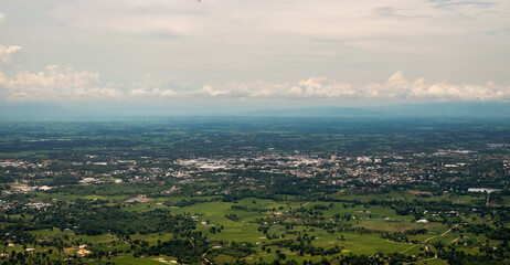 The beautiful natural landscape of a small urban community and fog in the rainy season of Thailand.