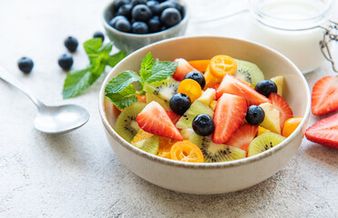 Healthy fresh fruit salad in a bowl