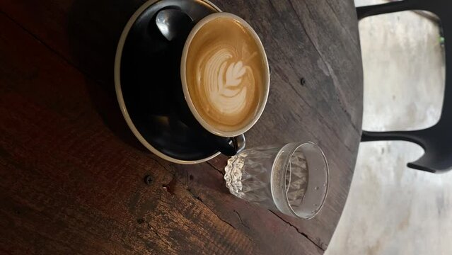 Latte art on the wood table