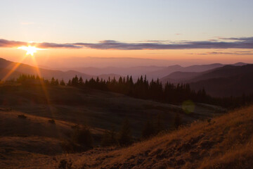 picturesque autumn sunrise image in mountains, autumn morning dawn, nature colorful background, Carpathians mountains, Ukraine, Europe	