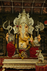 02 September 2022, Pune, Maharashtra, India, Huge idol of Lord Ganesh installed by Tulshibaug Mandal during Ganesh festival 2022.