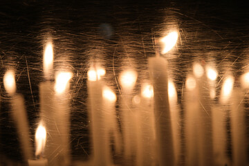 candles behind a glass