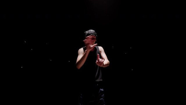 hip-hop dancer boy is dancing breakdance and freestyle, top breakdancer is rehearsing choreography