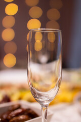 Glass on with bokeh background, festive glass, selective focus