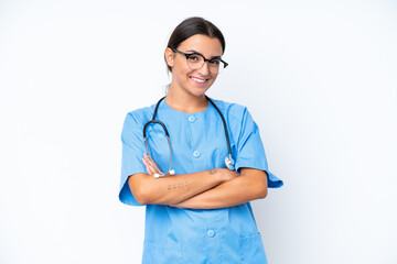 Young nurse woman isolated on white background keeping the arms crossed in frontal position