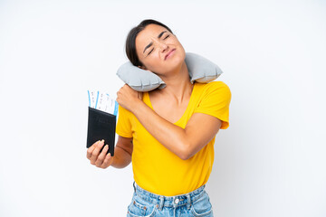 Woman with Inflatable Travel Pillow over isolated background suffering from pain in shoulder for having made an effort