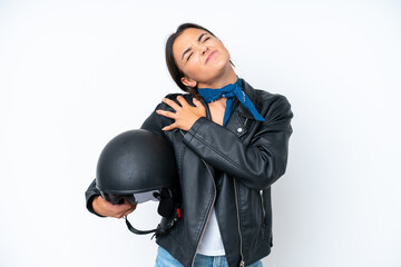 Young caucasian woman with a motorcycle helmet isolated on blue background suffering from pain in shoulder for having made an effort