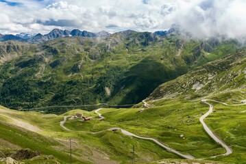 Fototapeta na wymiar Great St. Bernhard Pass, pass road in the Aosta Valley, at back mountain Gran Paradiso, Saint-rhemy-en-bosses, Valle d'Aosta, Italy, Europe