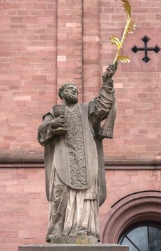 Baroque statue of St. Marcellinus in front of Einhardbasilika, Seligenstadt, Hesse, Germany, Europe