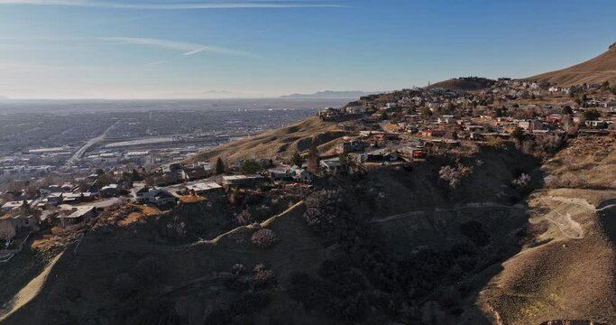 Salt Lake City Utah Aerial v69 cinematic low level flyover capitol hill capturing car driving uphill and beautiful victorian homes in hillside neighborhood - Shot with Mavic 3 Cine - February 2022