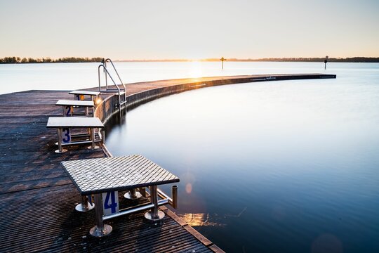 Wijderwold lake with starting blocks and aluminum stairs at the Zeewolde jetty in the Netherlands