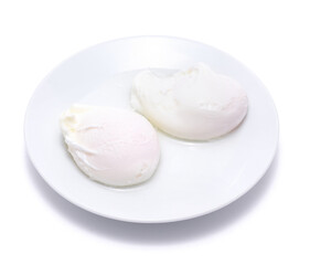 Fototapeta na wymiar Poached Eggs on white ceramic plate isolated on white background