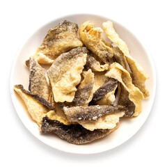 Crispy fried fishCrispy fried fish skin in cup on white background, clipping path included. skin in cup on white background.