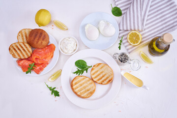 Breakfast Ingredients - Smoked salmon, poached egg and grulled buns