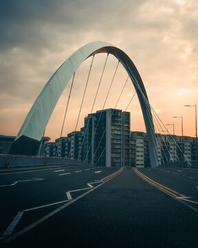 Asphalt road on a bridge in Glasgo during the sunset