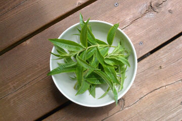 fresh homegrown lemon verbena in a bowl