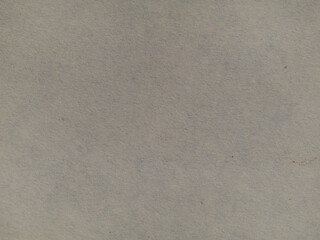 The background texture of paper, macro photo. Texture of yellowed paper for use as a background