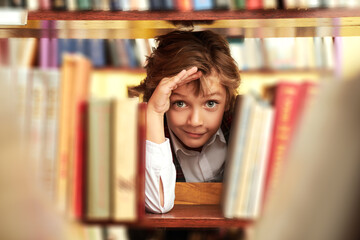 funny boy in library