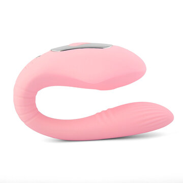 Dildo for vaginal and clitoral stimulation isolated in white.