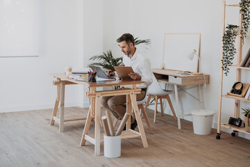Mature architect working at desk in office