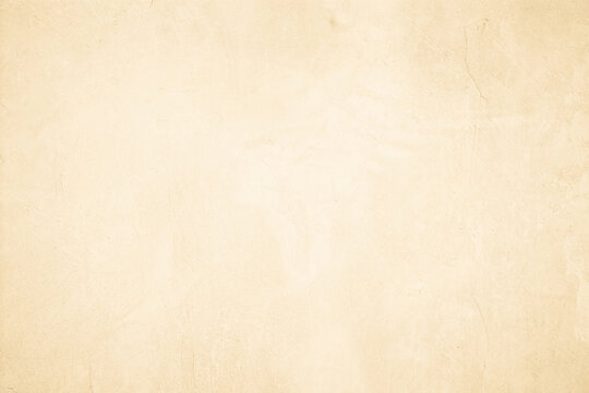 Old concrete wall texture background. Close up retro plain beige color cement material surface © Manitchaya