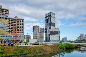 Fototapeta na wymiar Construction of new high - rise buildings .