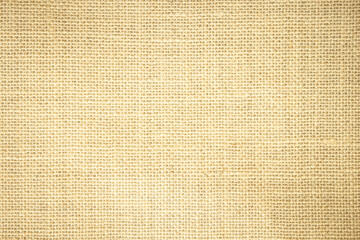 Jute hessian sackcloth burlap woven, linen texture pattern background in light beige cream brown color  canvas fiber line cotton cloth textured.