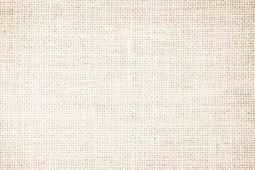 Jute hessian sackcloth burlap woven, linen texture pattern background in light beige cream brown color  canvas fiber line cotton cloth textured.