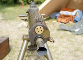 Detail of a historical gun barrel. It is a machine gun that has a round shape.