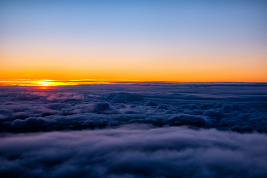 Scenic sunset over cumulonimbus clouds