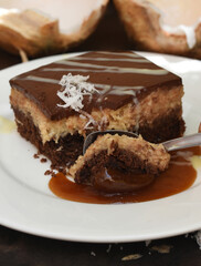 Bounty Cake made of fresh coconut on a table