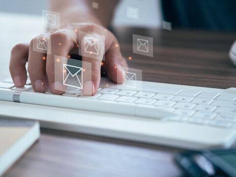 SMS marketing concept. Person using keyboard computer to send emails or text messages icon. Sending documents digitally using email.