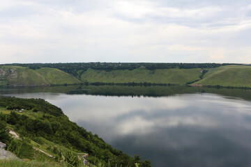 Bakota Bay view. The panoramic landscape of Dniester river, Ukraine. The banks of a large river with calm smooth water.