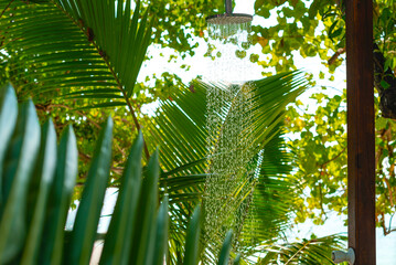 beach shower near the ocean on a tropical exotic island
